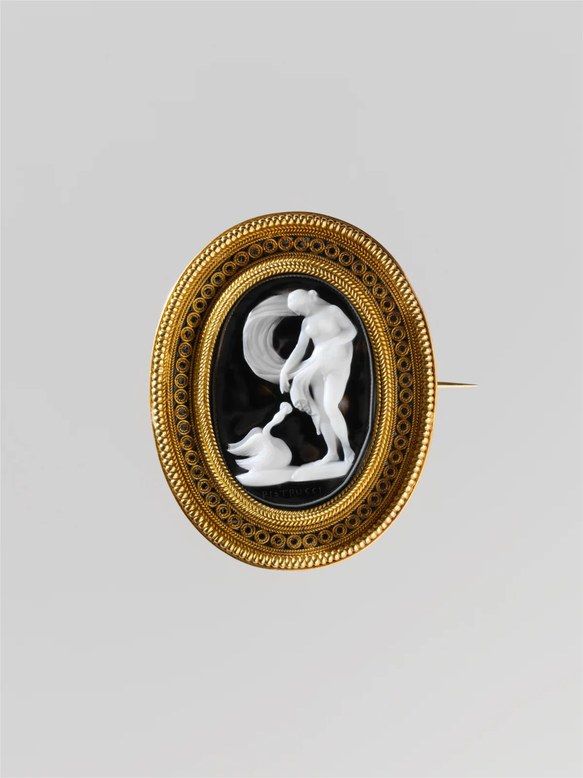 Agate cameo of a nymph with a swan, carved in white relief on a dark ground, mounted in gold with black enamel