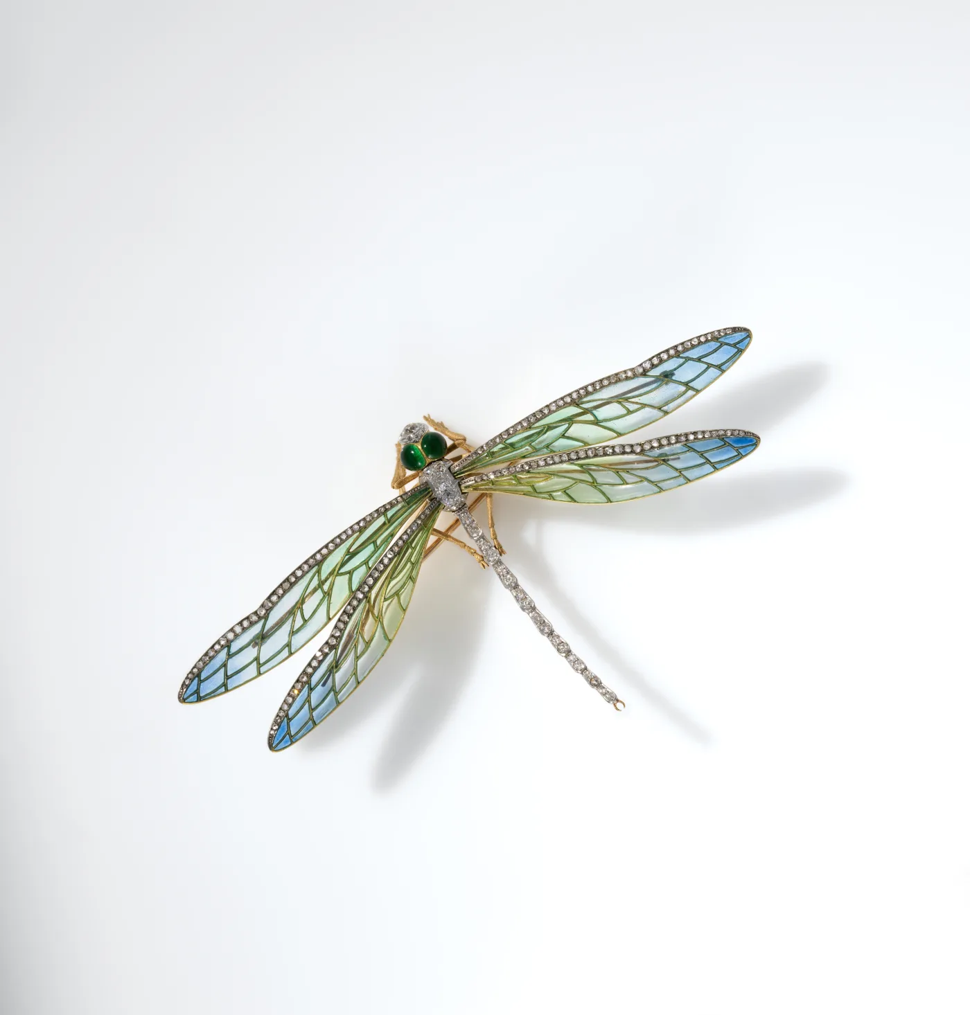 Gold and enamel dragonfly brooch by Edgar Bense showcasing delicate anatomical wing details and diamond accents