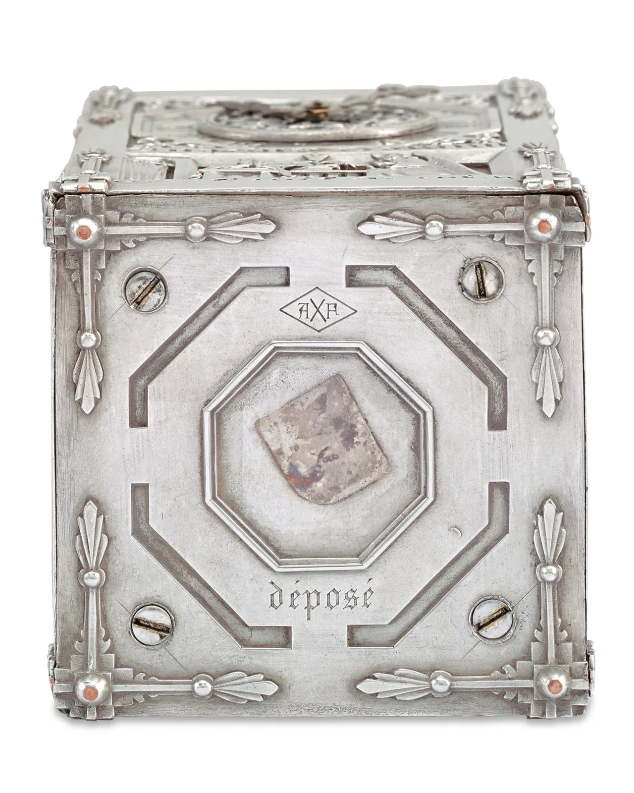 Underside of a French silver box, the surface engraved and stamped with a small lozenge-shaped maker's punch and the word depose